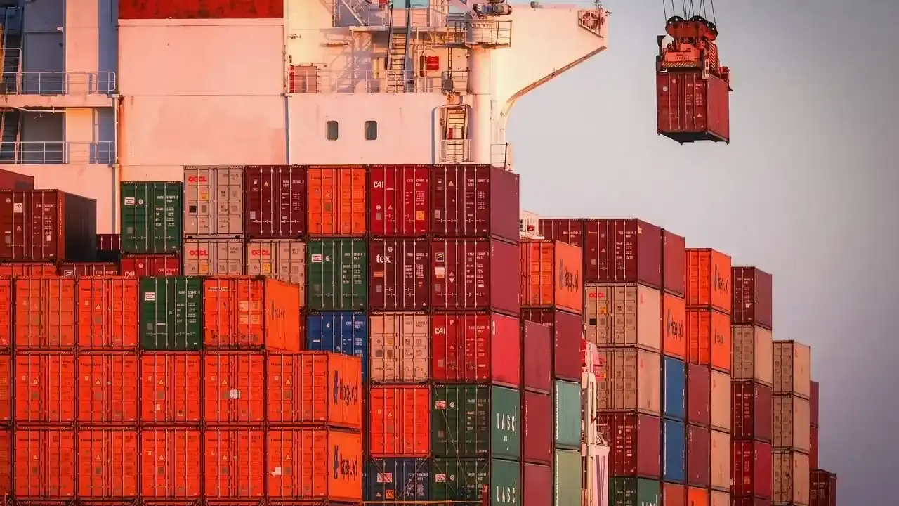 International shipping containers stacked at a port near Manhattan Beach California by Tiger Freight

