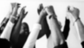 diverse-people-joining-hands-together.jpg