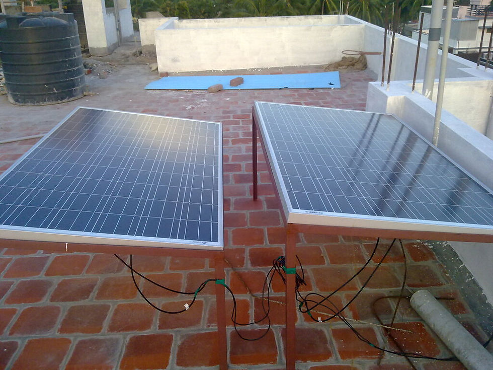 pair of small solar panels on a rooftop patio