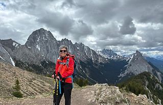 Profile picture, Rhiannon Carter Certified ADHD Coach & Educator, hiking in the mountains