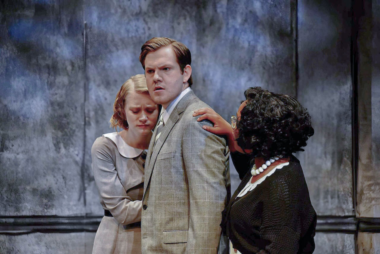 Actors framed by the illustrated architecture.