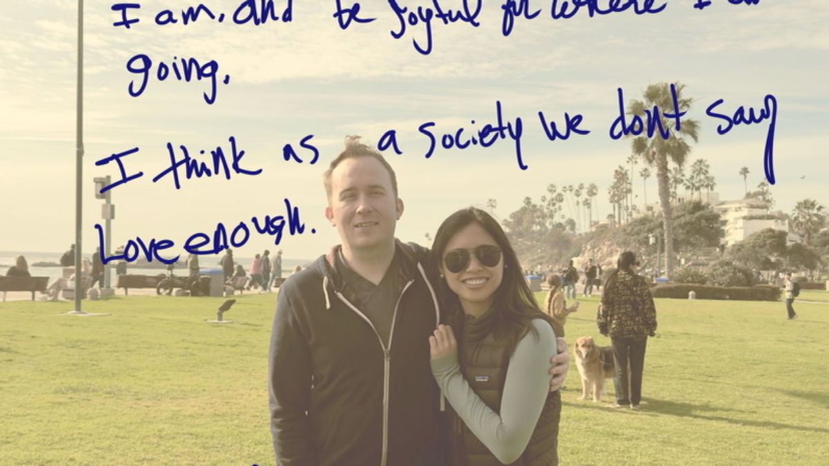 A handwritten birthday note over a photograph of Brandon PT Davis and his partner standing near the ocean.