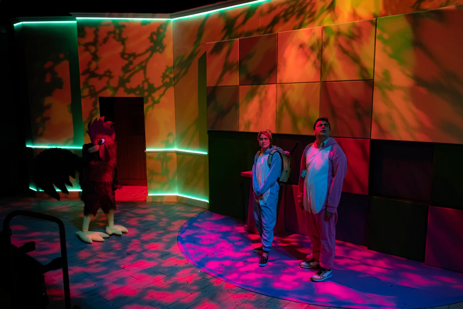 The playful theatrical world of the show.