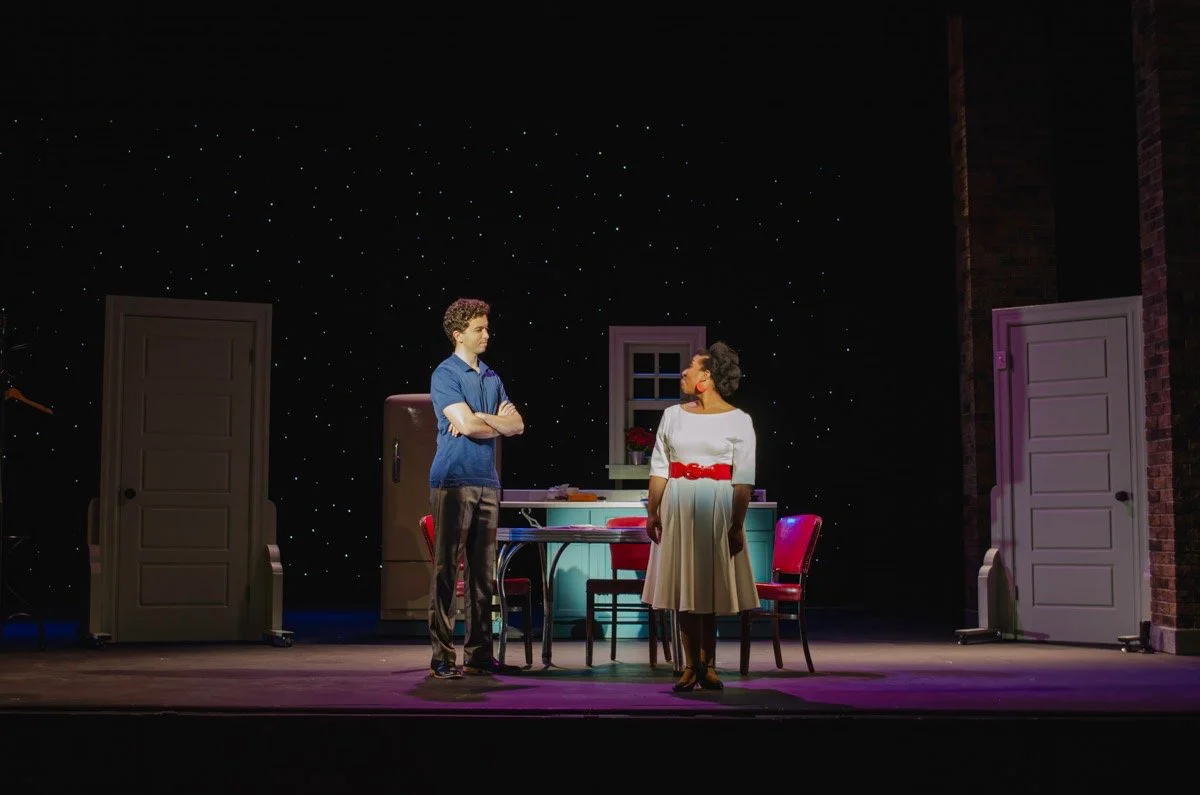 Dance staging and factory signage in view.