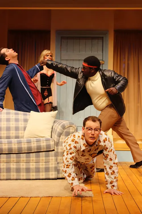 The farmhouse interior as romantic setting and comic engine for Don't Dress for Dinner at Okoboji Summer Theatre.