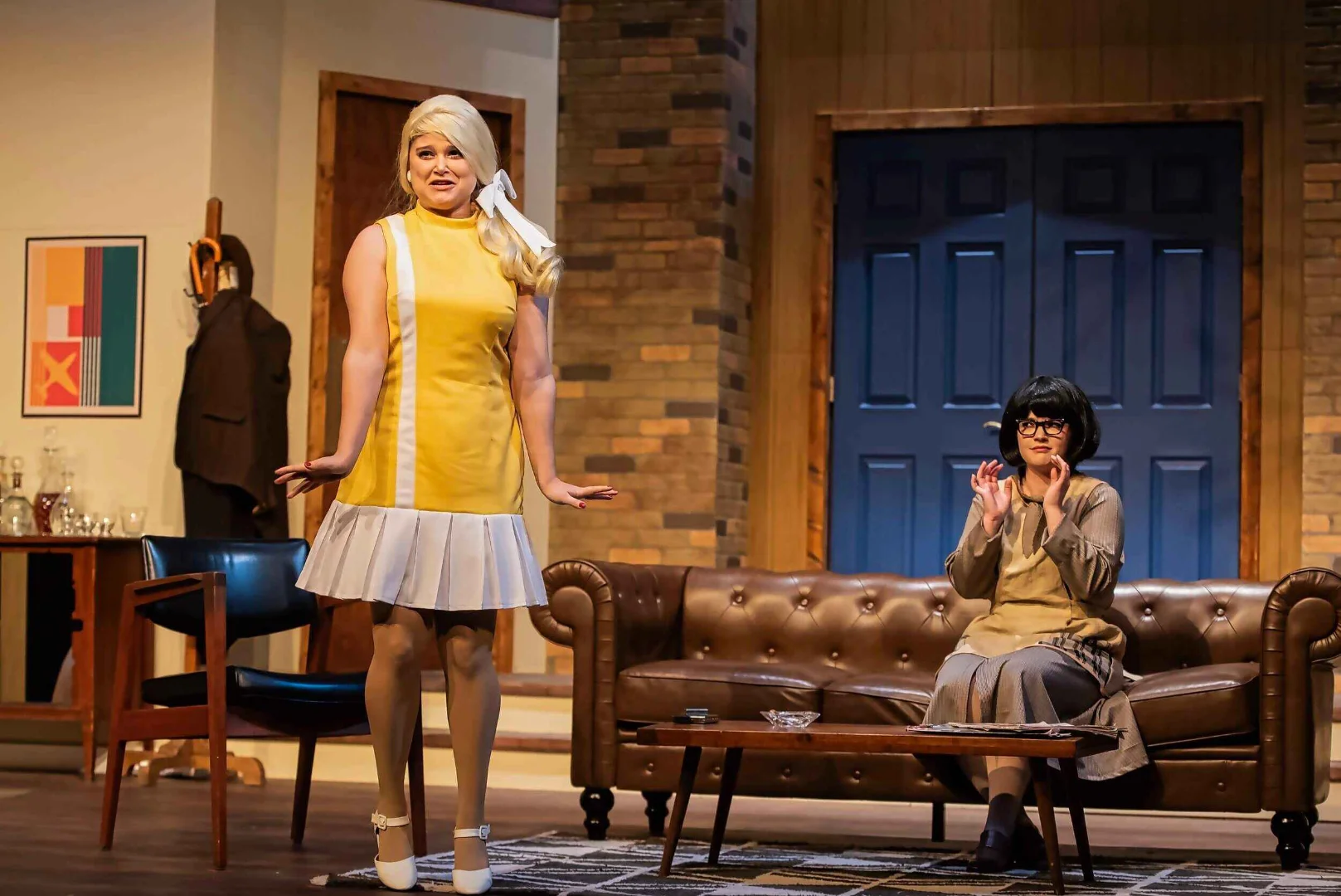 Actors moving through the apartment's choreographed doorways.
