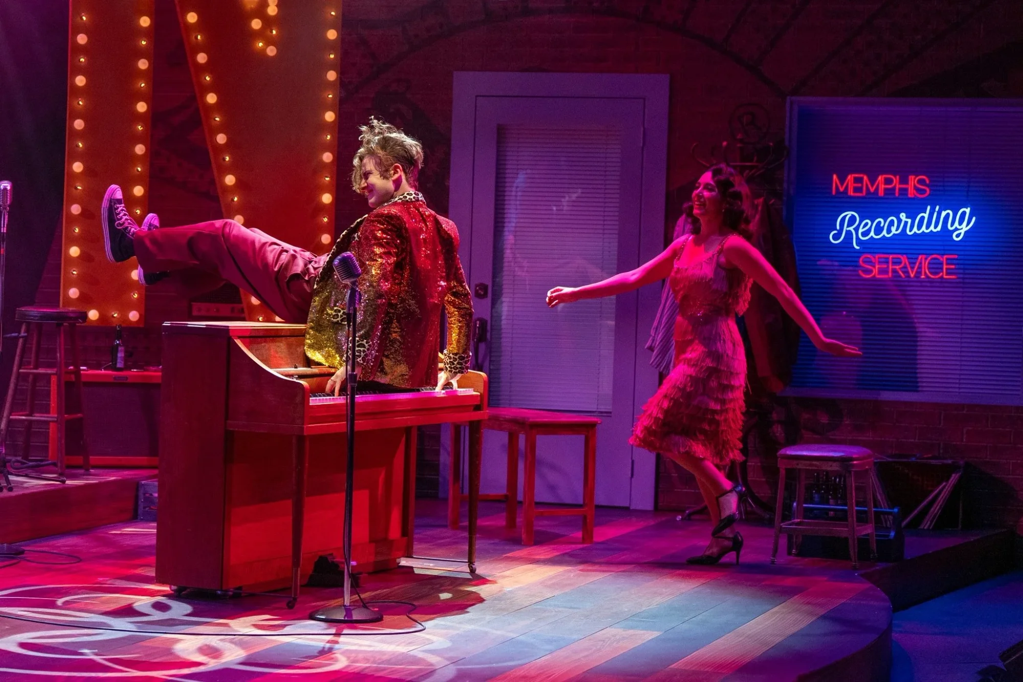 Wide audience-view perspective of the Million Dollar Quartet set.