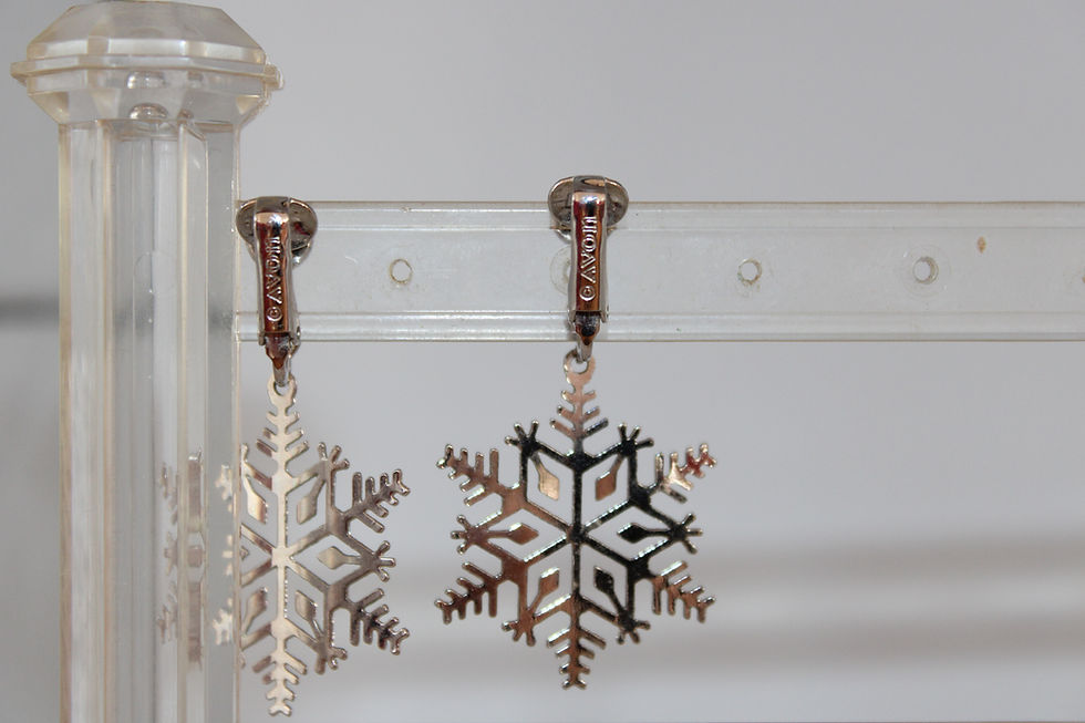 Thumbnail: Vintage Avon silver Snowflake Dangle Clip on Earrings