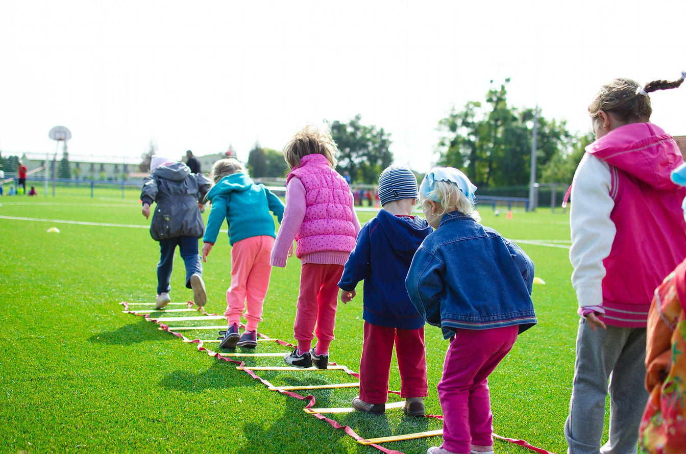 children-playing-on-grass.jpg