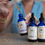 Thumbnail: Woman holding dropper with Detox Tonic herbal tincture liquid, part of Parasite Cleanse Bundle for detox and immune support