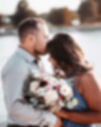 A couple snuggles after their elopement vows.