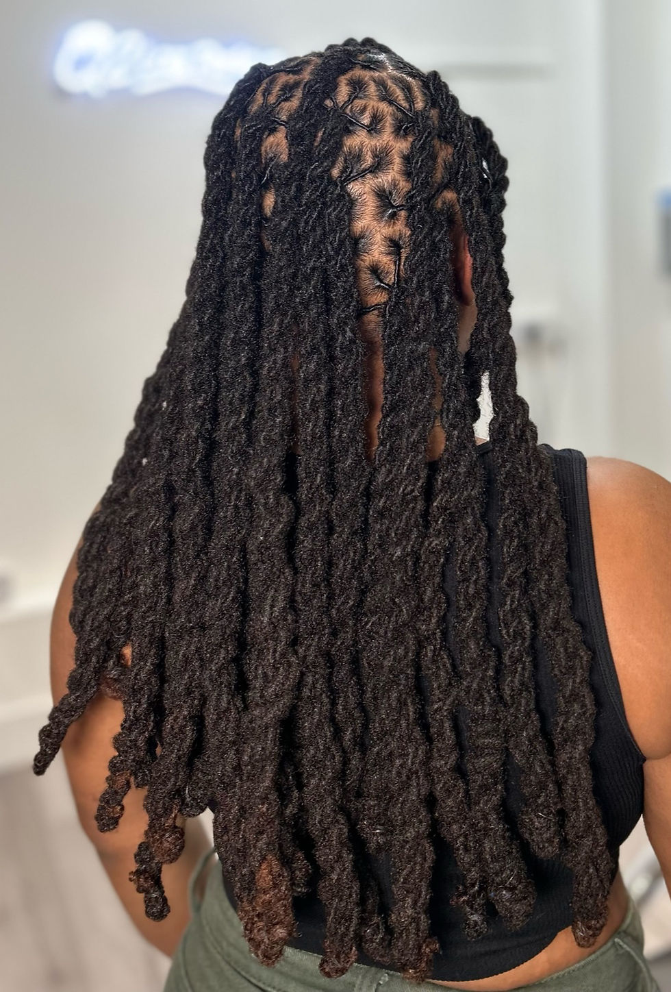 Close-up view of healthy locs with natural shine