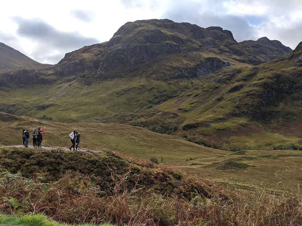 Green landscape with rolling hills in the Scottish Highlands