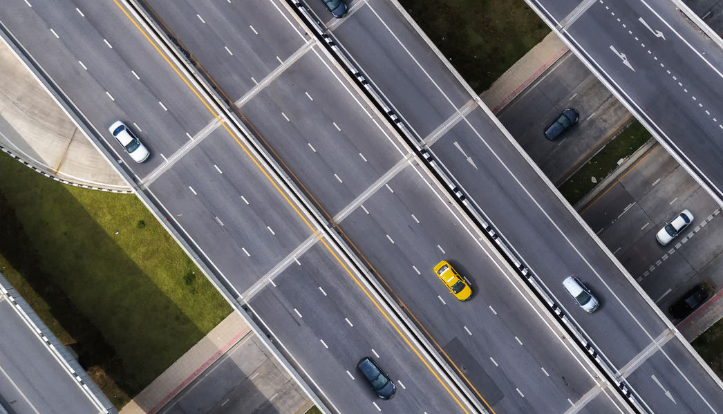 A drone photo of the highway with cars