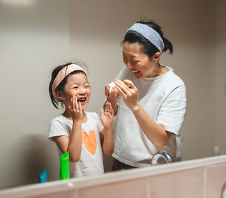 Mother And Daughter Laughing