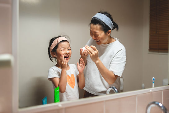 Mother And Daughter Laughing
