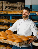 Young man in the bakery
