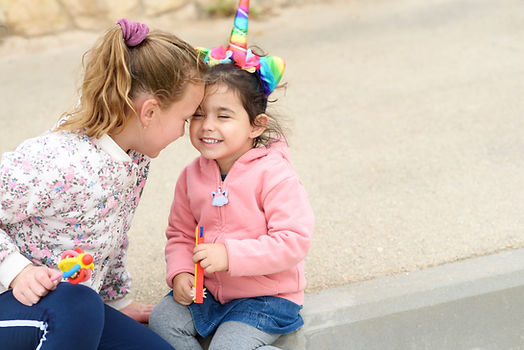 Two Girls Smiling