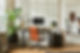 Office area with burnt amber leather chair, open space