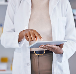 Pharmacist Using Tablet