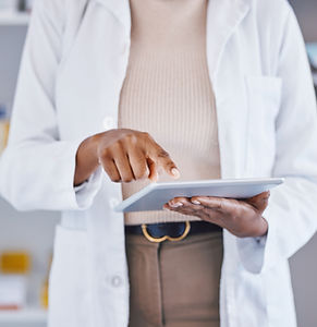 Pharmacist Using Tablet