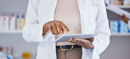 Pharmacist Using Tablet