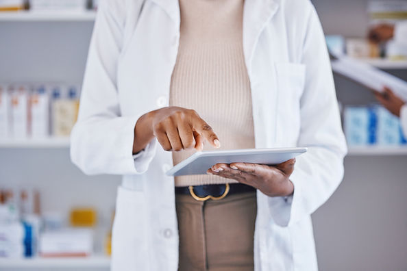 Pharmacist Using Tablet