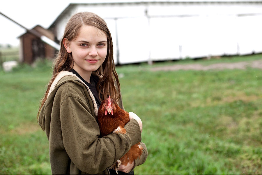 Girl Holding Chicken