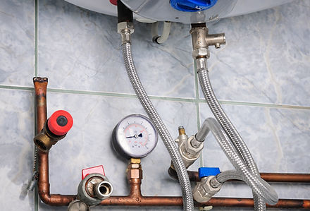 Copper heating system close up-with vents, gauge, switches and boiler