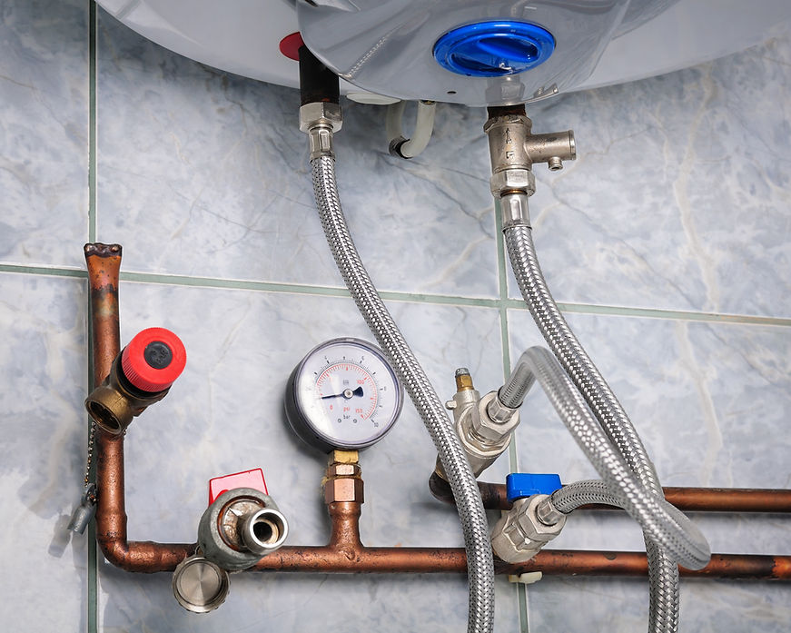 Copper heating system close up-with vents, gauge, switches and boiler