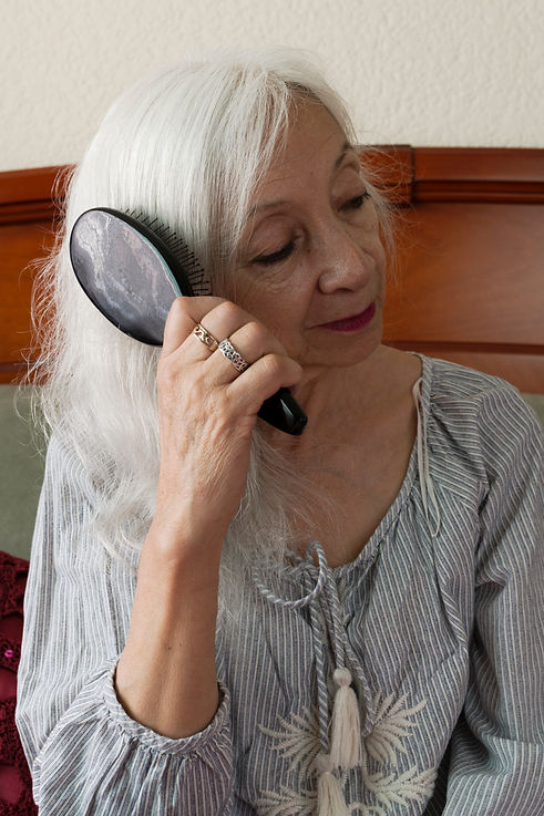 Woman Brushing Hair
