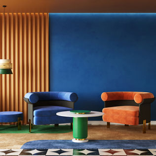 Stylish room with blue and orange armchairs, green plant, and geometric lamps on checkered floor. Bold blue and orange walls.