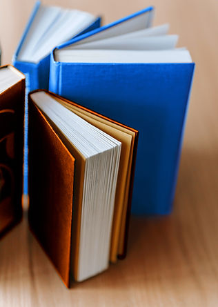 Books on Wooden Table