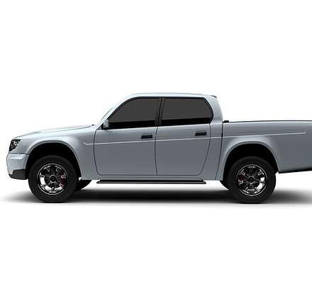 Silver pickup truck in profile view on a white background