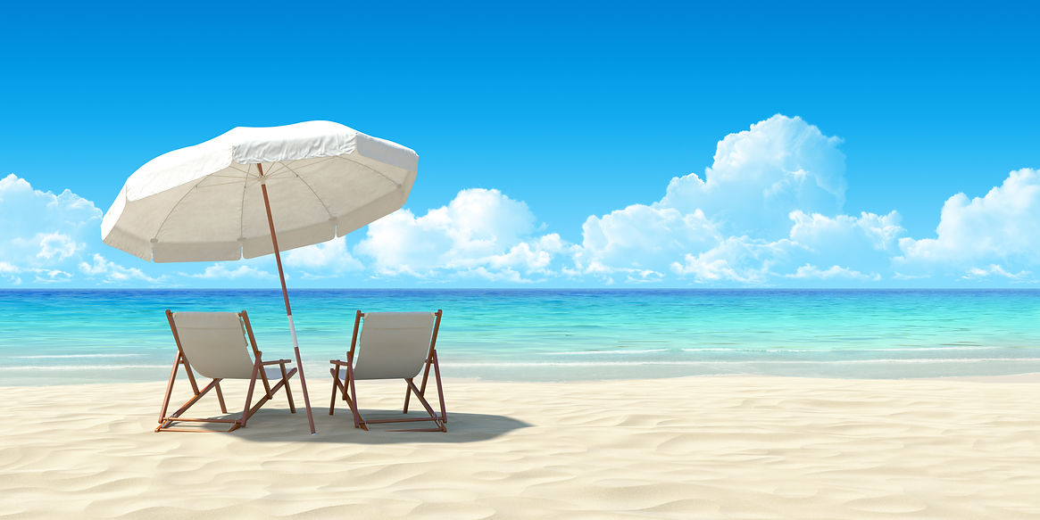 Beach chair and umbrella on sandy beach
