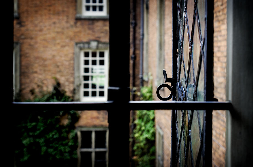 Looking out through an open leaded window