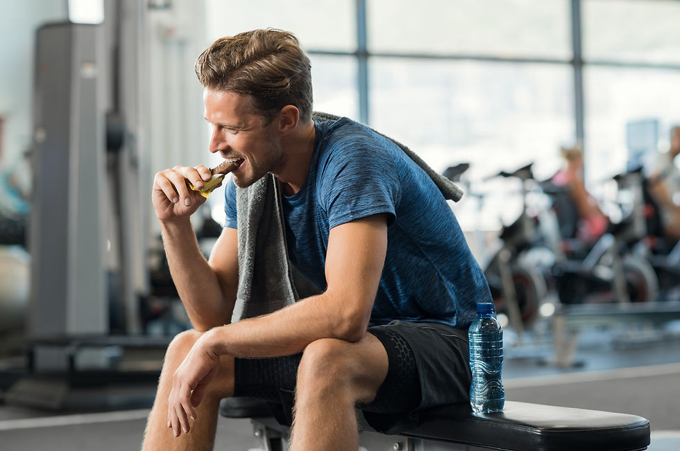 Man eating protein bar