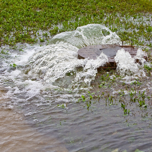 manhole cover bubbles over