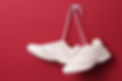 Hanging White Shoes