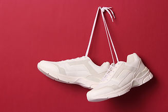 Hanging White Shoes