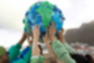 People Holding Globe