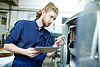 Handyman working on machine