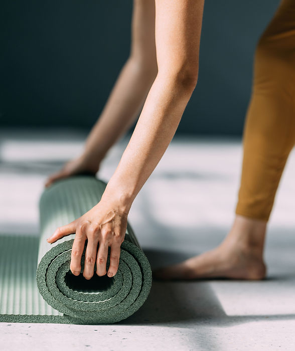 Unrolling Yoga Mat