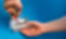 Close-up of an electrician fixing a socket on a wall