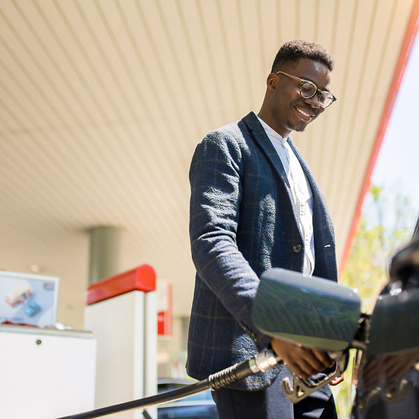 Man Refueling Vehicle