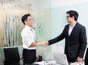 Business Professionals Shaking Hands