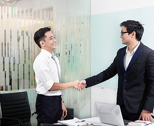 Business Professionals Shaking Hands