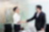 Business Professionals Shaking Hands