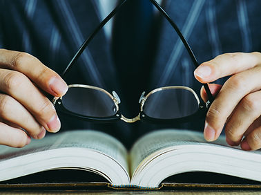Book and Eyeglasses