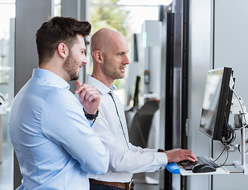 People discussing with a computer